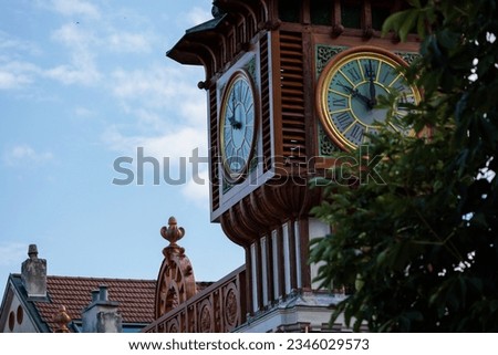 Refreshment room Cachat and its clocktower being restored, near the historical mineral water source in Evian-les-Bains, Haute Savoie, France