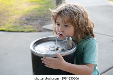 Refreshment Solution. Thirsty Kid Drink Water From Drinking Fountain. Thirst Quenching