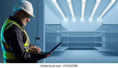 Refrigerated chambers. Engineer Check refrigeration equipment. Cold product warehouse. Industrial refrigerator. Warehouse with metal shelves. Storage and logistics business. - Shutterstock ID 1972520789