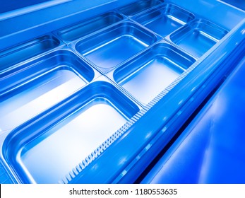 Refrigeration Plant For Food. Storage Of Food In The Refrigerator. Metal Pallets For The Refrigerating Chamber. Industrial Refrigerator. Commercial Equipment With A Refrigerating Chamber.