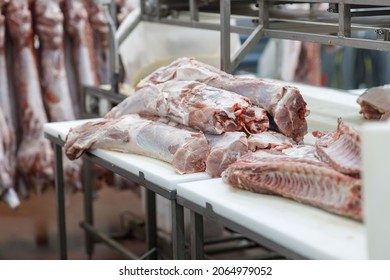 Refrigerator Pork And Veal Meat Storage. Meat Packing Industry Pork Carcasses In The Workshop Of Butchers. Industrial Processing Of Pork. Butcher. Slaughterhouse. Halal Cutting.