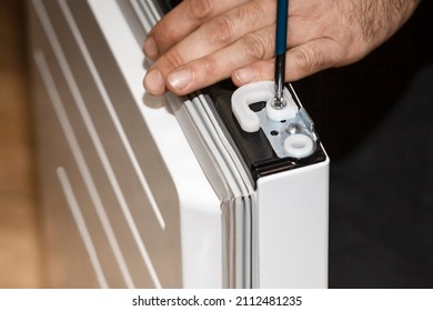 Refrigerator  Service Install Refrigerator Door. Repair Man Screwing Fridge Door By Screwdriver.