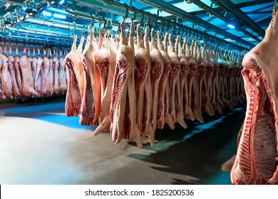 Refrigerator for storing suspended pork carcasses
