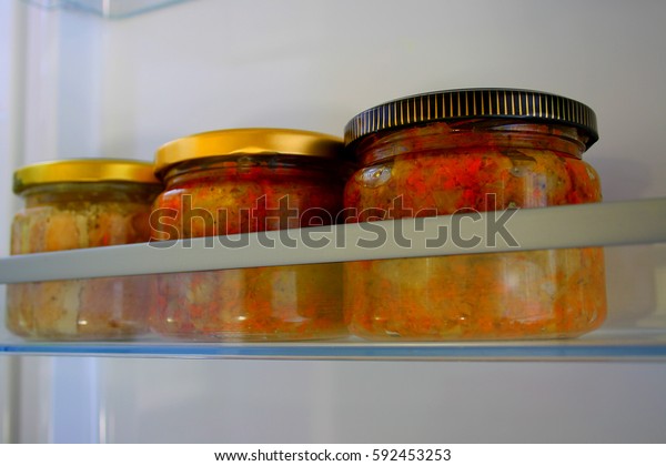 In\
the refrigerator supply of food canned in glass\
jars