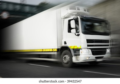 Refrigerator Truck  In Motion On The Highway