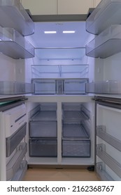 A Refrigerator With A Wide Open Door