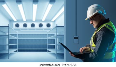 Refrigerators compartment. Warehouse with shelves for food storage. Grocery warehouse with air conditioning. Stelms with shelves.  Industrial refrigerator. Engineer sets up refrigeration equipment.