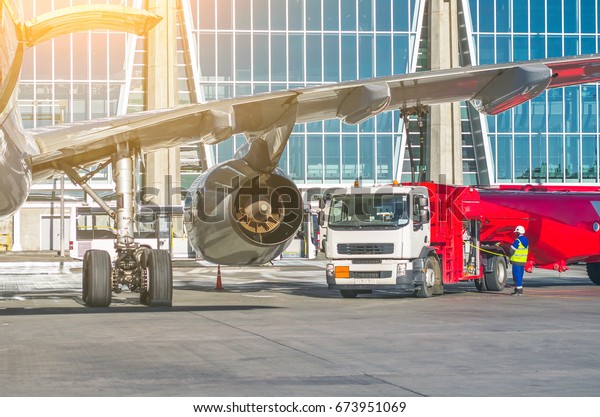 Refueling\
aircraft, aircraft maintenance at the\
airport.