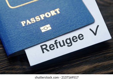 Refugee Passport On Table At Border Control In Europe, Document With Refugee Note Close-up. Concept Of Ukraine War, Syria, EU, Humanitarian Crisis, Migration And Emigration.