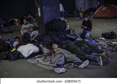 Refugees And Migrants Sleep In A Warehouse In Piraeus Port, Near Athens, Greece, On The 2nd Of March 2016.