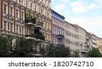 Refurbished old building facades in the green streets of the districts Prenzlauer Berg and Pankow in Berlin, Germany