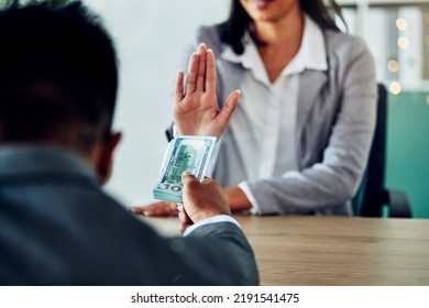 Refusing illegal bribe, corruption and dirty money to avoid unethical, fraud and dishonest crime at work. Business woman, politician and government official stop to no bribery, solicit and extortion - Shutterstock ID 2191541475