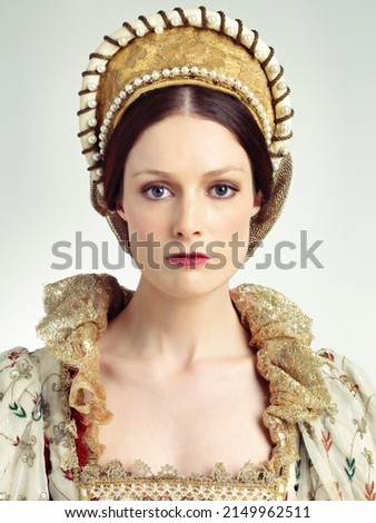 Regal beauty. Studio shot of beautiful young queen.