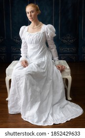 A Regency Woman Wearing A White Muslin Dress 