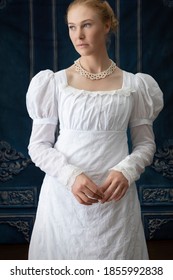 A Regency Woman In A White Muslin Dress Alone In A Room