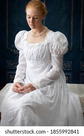 A Regency Woman In A White Muslin Dress Alone In A Room