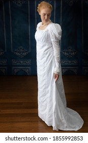 A Regency Woman In A White Muslin Dress Alone In A Room