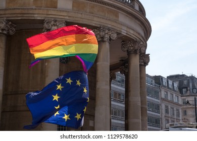 Regent Street, London UK. Close Up Of Rainbow LGBT Flag And EU Flag Flying Together At The Gay Pride Parade In London 2018. Photographed Outside All Souls Church, Langham Place.