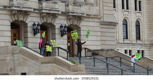 Regina, Saskatchewan Canada - March 16 2021 : Covid-19 Anti-mask Protestors Steps Of Legislature Building