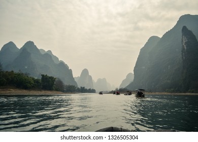 The region of Yangshuo is surrounded by irregular limestone formations of mesmerizing shapes. The village of Yangshuo itself is surrounded by this karstic formations