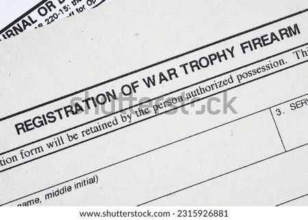Registration of war trophy firearm form. US Army old paper background.
