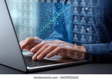 Regression analysis of customer behavior data. Statistical marketing analytics for effectiveness measurement and prediction. Marketer analyzing data with using laptop computer at desk in office.
