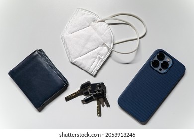 A Regular Persons Everyday Carry Has Changed Since Covid 19, Now It Consits Of Keys, Phone, Wallet, And A Mask.