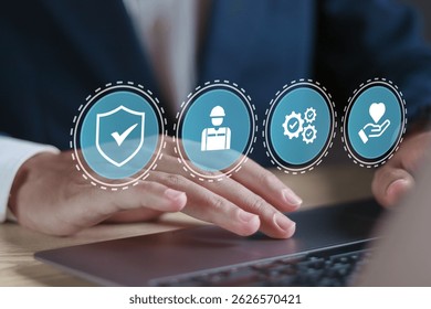 Regulations and standard in industry. Working standard process and zero accidents. Businessman using laptop with work safety icon on virtual screen.