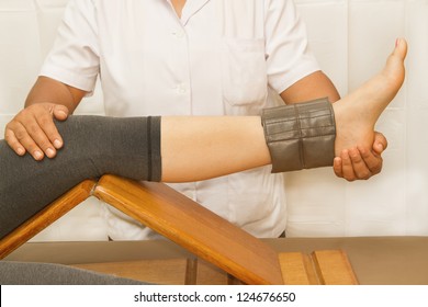 Rehab training for knee and Quadriceps muscle with physical therapist - Powered by Shutterstock