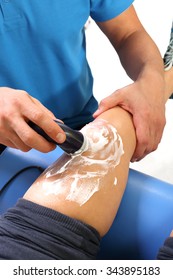 The Rehabilitation Of The Knee.Physiotherapist Doctor Performs Surgery On A Patient's Leg