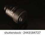 Rehovot, Israel, 01. 28. 2024 Nikkor 105 macro lens on black surface close up