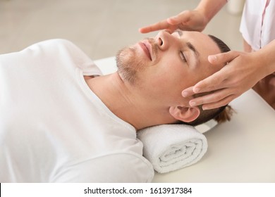 Reiki Master Working With Patient