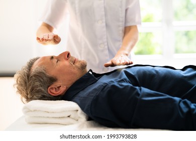 Reiki Therapy Alternative Healing Massage For Man - Powered by Shutterstock