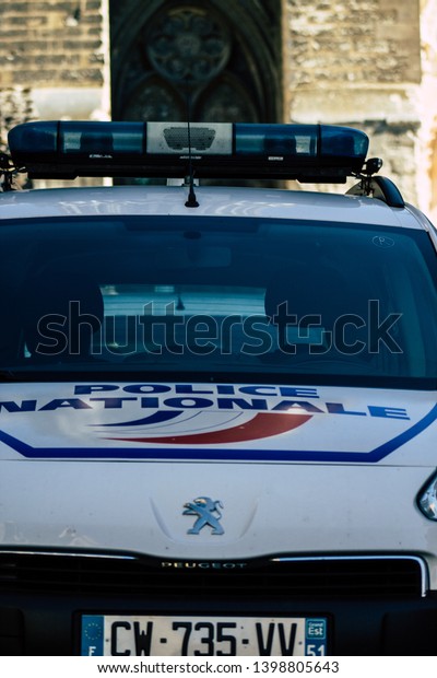 Reims\
Champagne France May 15, 2019 Closeup of a classic French police\
car parked in the streets of Reims in the\
afternoon