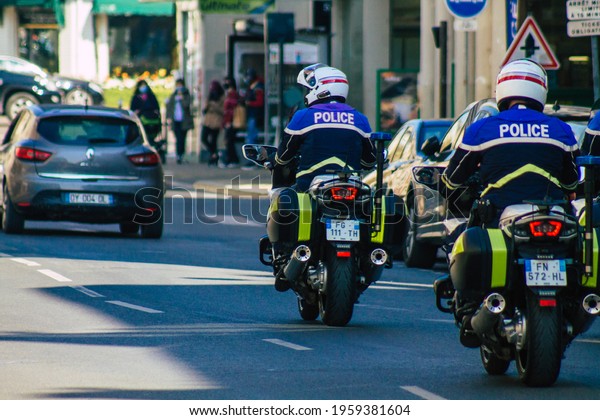 Reims\
France April 15, 2021 Police motorcycle rolling in the streets\
during the coronavirus outbreak hitting\
France