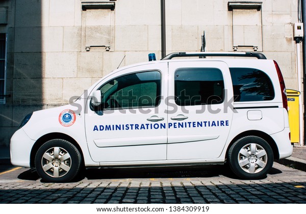 Reims France April 21, 2019 Closeup of a
white police car of the penitentiary administration parked front
the tribunal of Reims in the
afternoon