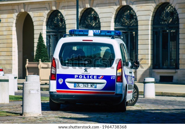 Reims\
France April 26, 2021 Police car patroling in the streets of Reims\
during the coronavirus outbreak hitting\
France