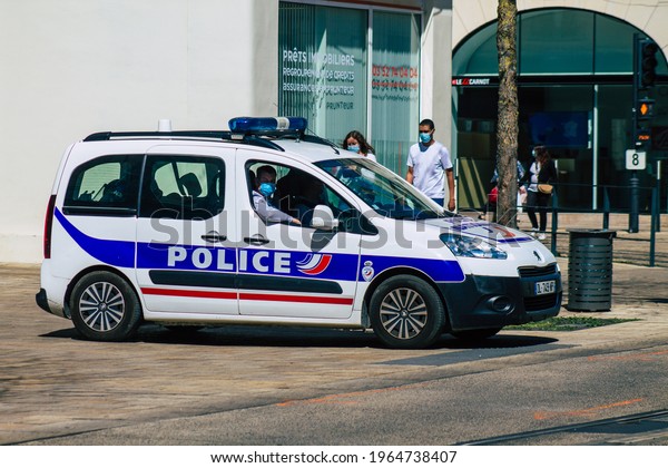 Reims\
France April 26, 2021 Police car patroling in the streets of Reims\
during the coronavirus outbreak hitting\
France