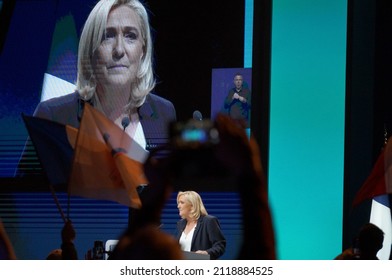 Reims, France - Feb. 5, 2022 - Marine Le Pen appears on giant screen, during her speech at the Rassemblement national's Convention ; she is a member of the National Assembly and runs for President