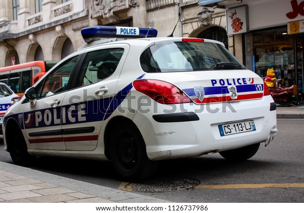 Reims France July 03,\
2018 View of a French police car parked in the street of Reims in\
the afternoon