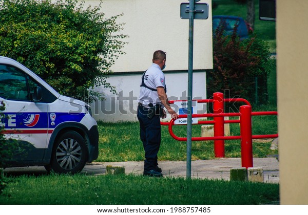 Reims France June 08, 2021 Police patrol enforcing\
social distancing in the streets of Reims during the coronavirus\
epidemic which hits\
France