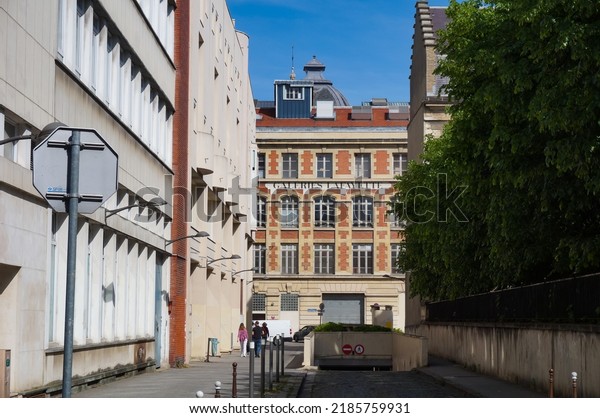 Reims, France - June 2022 - Henri Menu Street,\
between the ESAD Reims (Design Superior School) and the Fine Arts\
Museum, heading to the back of the Galeries Lafayette store, seen\
from Rue Libergier