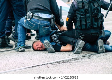 Reims France May 18, 2019 View of unknown rioter under arrest by the police in the streets of Reims during the protests of the Yellow Jackets on Saturday afternoon
