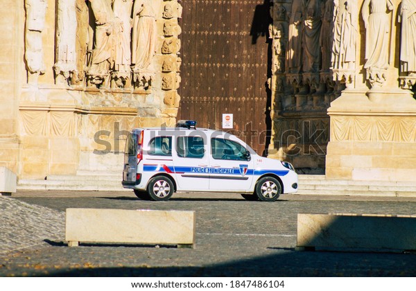 Reims France\
October 31, 2020 View of a French police car parked front the\
Cathedral of Reims to prevent a terrorist attack during the\
Coronavirus pandemic affecting\
France