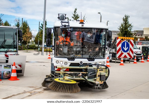 Reims, France - September 17, 2022 Street\
cleaning cars and garbage truck parked in the streets of Reims\
taking part in the world day to clean up our planet, garbage\
collection helps prevent\
pollution