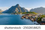 Reine, in the beautiful Lofoten Islands, offers stunning mountains and clear waters, ideal for travel lovers and nature enthusiasts seeking adventure and breathtaking beauty