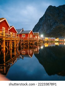 Reine at night, Lofoten, Norway. Traditional Norwegian fisherman with cabins. Photographed at dawn in autumn or winter. - Shutterstock ID 2223387891