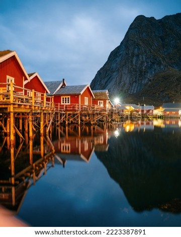 Reine at night, Lofoten, Norway. Traditional Norwegian fisherman with cabins. Photographed at dawn in autumn or winter. Stock photo © 