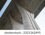 reinforced concrete bridge pillar. modern concrete construction. Concrete pillar heads supporting the road bridge. Line building architecture