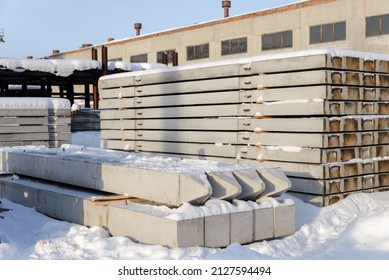 Reinforced Concrete Products Such As Piles And Airfield Road Slabs Are In The Warehouse Of The Plant.